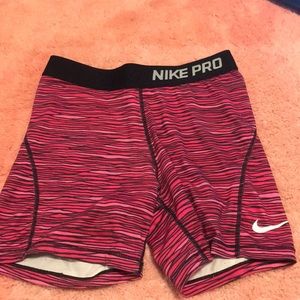 Light pink and pink Nike pro shorts